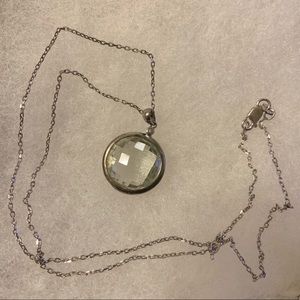 Sterling silver necklace with disco ball-esque pendant
